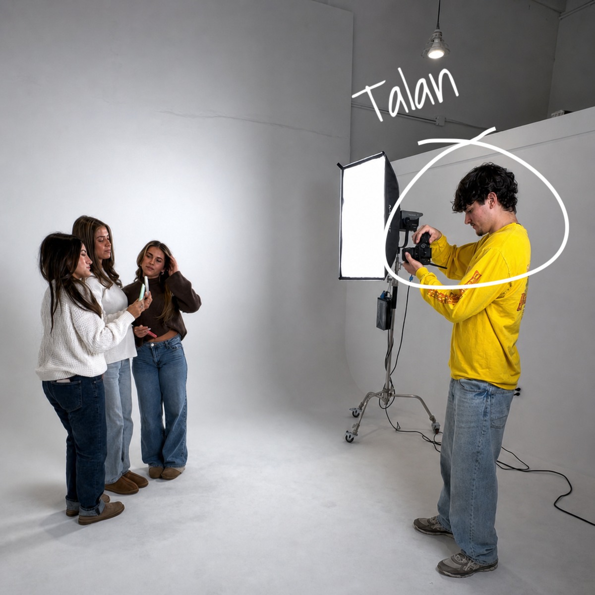 Talan filming a group in a studio